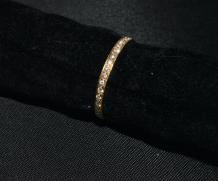 Roodgouden alliance ring volgezet met briljant geslepen diamantjes